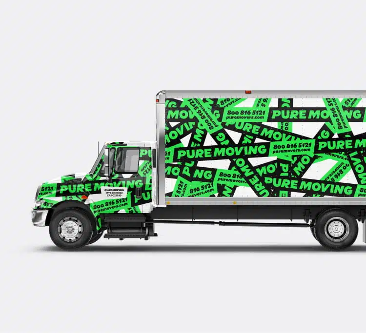 A green and black Pure Moving branded truck, featuring contact information and the website displayed on the side, embodies the values shared in our About Us section.